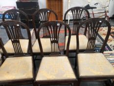 A SET OF SIX LATE 19th C. MAHOGANY HOOP BACKED DINING CHAIRS, THE SPLAT TOPS CARVED WITH WHEAT EARS,