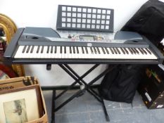 A YAMAHA PSR-GX76 ELECTRIC ORGAN ON FOLDING STAND AND WITH CARRYING CASE.