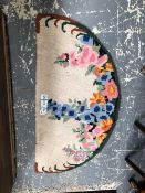 A FLORAL DESIGN ORIENTAL RUG. 155 x 93cms. TOGETHER WITH AN ART DECO TUFTED RUG OF SHAPED FORM (2)