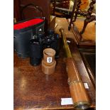 AN ANTIQUE LEATHER BOUND BRASS FOUR DRAW TELESCOPE BY PARKER, BISLEY WORKS, BIRMINGHAM, AND A PAIR