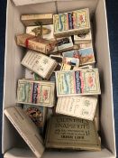 A COLLECTION OF CIGARETTE PACKETS AND CARDS