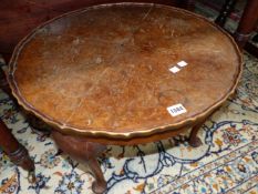 A YEW WOOD CIRCULAR COFFEE TABLE, AN OAK TABLE WITH BARLEY TWIST LEGS TOGETHER WITH A BLACK AND GILT