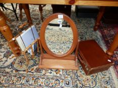 AN OVAL DRESSING TABLE MIRROR IN A PINE FRAME, A BAMBOO MAGAZINE RACK TOGETHER WITH A LEATHER SUIT