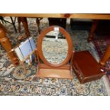 AN OVAL DRESSING TABLE MIRROR IN A PINE FRAME, A BAMBOO MAGAZINE RACK TOGETHER WITH A LEATHER SUIT