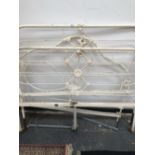 A PAIR OF WHITE PAINTED IRON DOUBLE BED HEADS TOGETHER WITH A SINGLE HEAD BOARD.