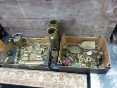 BRASSWARE: TO INCLUDE HORSE BRASSES, SHELL CASES AND CANDLESTICKS