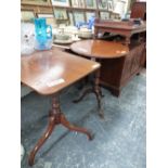 TWO MAHOGANY TRIPOD TABLES, ONE WITH A RECTANGULAR TOP AND THE OTHER OVAL