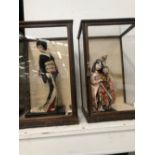 TWO JAPANESE DOLLS WITHIN GLAZED CASES