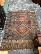 AN ANTIQUE PERSIAN TRIBAL RUG. 170 x 120cms