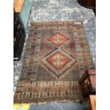 AN ANTIQUE PERSIAN TRIBAL RUG. 170 x 120cms