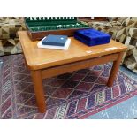 A DANISH TEAK COFFEE TABLE. W 75 x D 74 x H 42cms.