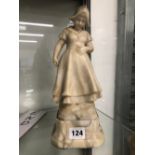 A 19th C. WHITE ALABASTER FIGURE OF A DUTCH GIRL. H 28cms.