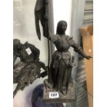 A SPELTER FIGURE OF JOAN OF ARC TOGETHER WITH ANOTHER OF A SEATED 17th C. AUTHOR