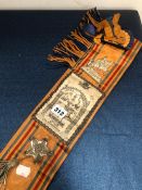 A NORTHERN IRELAND ORANGE ORDER SHOULDER SASH