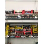 A COLLECTION OF BOXED DIE CAST MOTORBIKES TOGETHER WITH SPORTSCAR CARS WITH OTHERS BY CORGI AND