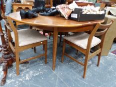 A 1970S TEAK EXTENDING DINING TABLE TOGETHER WITH FOUR CHAIRS, THE TABLE EXTENDED. W 161 x D 122 x H