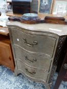 A SILVERED CHEST OF THREE SERPENTINE FRONTED DRAWERS. W 54 x D 40 x H 78cms.