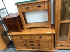 A CONTEMPORARY OAK SIDE CABINET WITH DRAWERS AND CUPBOARDS. 142 x 86 x 49cms TOGETHER WITH A SIMILAR