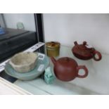 TWO ORIENTAL REDWARE TEAPOTS, A PALE CELADON SMALL DISH, A CRACKLE GLAZED BOWL, A HARDSTONE SEAL,