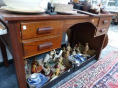 A 1940S OAK FOUR DRAWER DESK ON SQUARE LEGS. W 133 x D 72 x H 766cms.