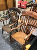 AN ANTIQUE COUNTRY SPINDLE BACK ARMCHAIR TOGETHER WITH A SIMILAR ROCKING CHAIR