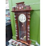 A CONTINENTAL WALNUT CASED WALL CLOCK OF VIENNA TYPE