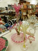 AN ANTIQUE EPERGNE, A SIMILAR SLENDER VASE AND A LATER FLAN STAND.