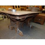 A 19th CENTURY CONTINENTAL WALNUT GOTHIC REVIVAL EXTENDING DINING TABLE ( FOR RESTORATION)