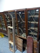 A GEORGIAN AND LATER MAHOGANY BREAK FRONT BOOK CASE, GLAZED FOUR DOOR UPPER SECTION ABOVE FAUX