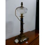 A VINTAGE BRASS AND CUT GLASS CONVERTED OIL LAMP