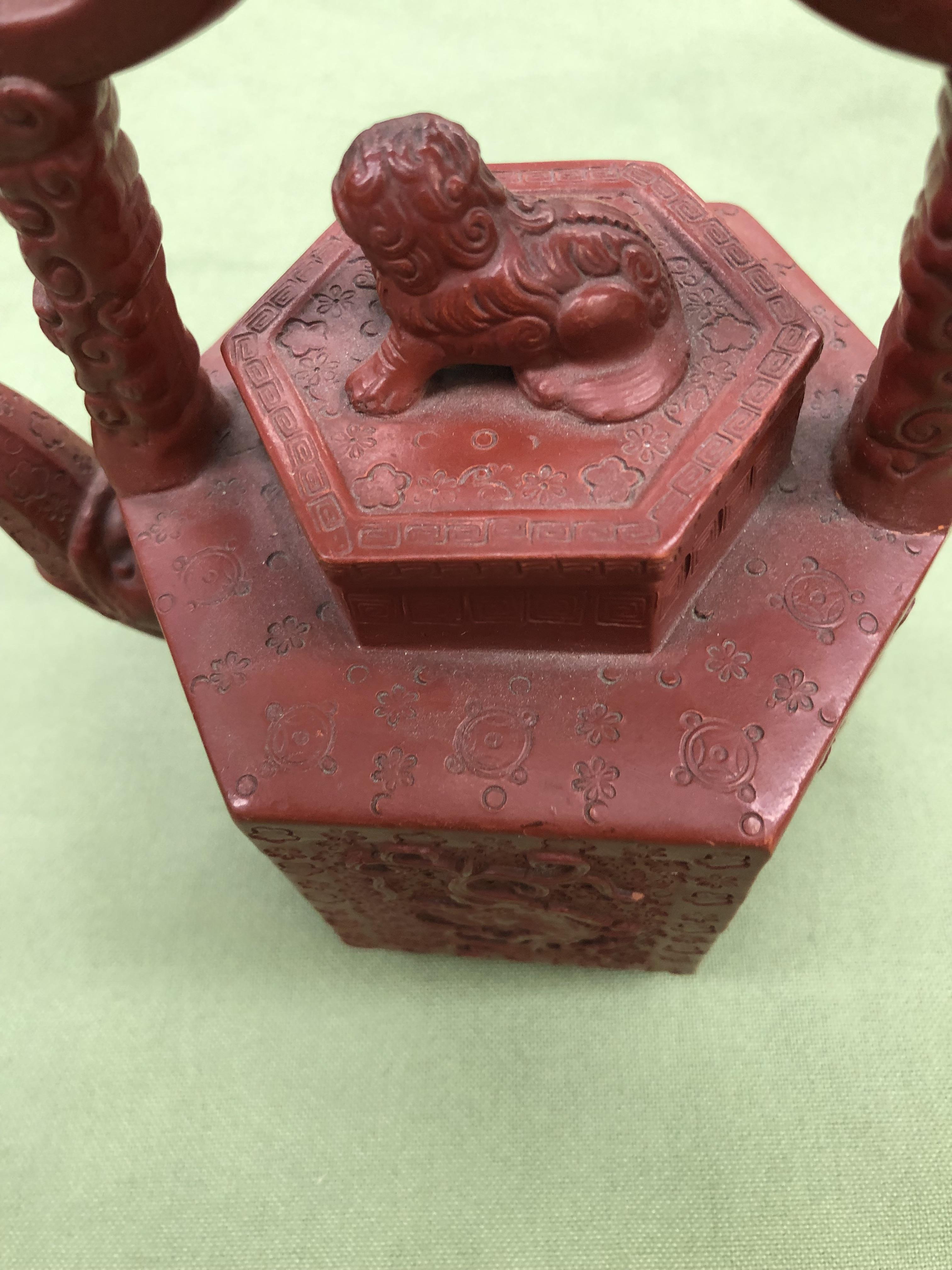 A CHINESE RED WARE TEAPOT. - Image 7 of 7