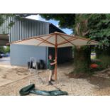 A VERY LARGE WHITE COLONIAL SHADE GARDEN PARASOL 3.75M SQUARE.