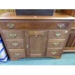 A VINTAGE TEAK CABINET LIFT TOP ABOVE DRAWERS AND CUPBOARD. H 86 x W 108 x D 47cms