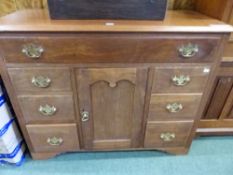 A VINTAGE TEAK CABINET LIFT TOP ABOVE DRAWERS AND CUPBOARD. H 86 x W 108 x D 47cms