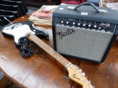 A FENDER FRONTMAN 15R AMPLIFIER TOGETHER WITH A FENDER SQUIER STRAT GUITAR