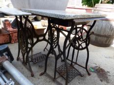 TWO GARDEN TABLES WITH SEWING MACHINE BASES AND VINTAGE OIL PUMP