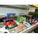 A QUANTITY OF VARIOUS DIE CAST VEHICLES, INC. BERAGO, REVELL, CORGI, MINI CHAMPS, ETC.