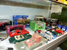 A QUANTITY OF VARIOUS DIE CAST VEHICLES, INC. BERAGO, REVELL, CORGI, MINI CHAMPS, ETC.