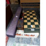 A WOODEN CHESS SET IN A FOLDING BOARD, A CHINESE SCROLL, BOXED PAIR OF BALLS AND A BOXED SET OF