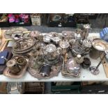 A LARGE COLLECTION OF SILVER PLATED WARE TO INCLUDE COFFEE POTS,CANDLE STICKS, SWING BASKETS,