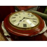 AN OAK CASED WALL CLOCK STRIKING ON A BELL. Dia. 41cms.