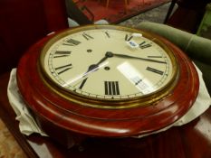 AN OAK CASED WALL CLOCK STRIKING ON A BELL. Dia. 41cms.