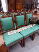 SET OF SIX VICTORIAN CARVED OAK GOTHIC REVIVAL DINING CHAIRS.