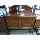 A VINTAGE CARVED OAK SMALL MIRROR BACK SIDEBOARD H 124 x W 107 x D 47cms