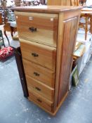 A CONTEMPORARY HARD WOOD TALL FIVE DRAWER CHEST H 136 x W 54 x D 53cms