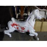 AN ALUMINIUM FAIRGROUND HORSE