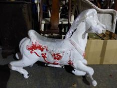 AN ALUMINIUM FAIRGROUND HORSE