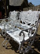 A SUITE OF VICTORIAN STYLE CAST GARDEN FURNITURE