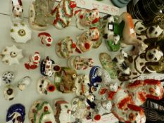 A QUANTITY OF ANTIQUE AND LATER STAFFORDSHIRE FIGURES AND COTTAGES