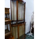 TWO VINTAGE SHAPED FRONT GLAZED DISPLAY CABINETS LARGEST H 109 W 106 D 33cms
